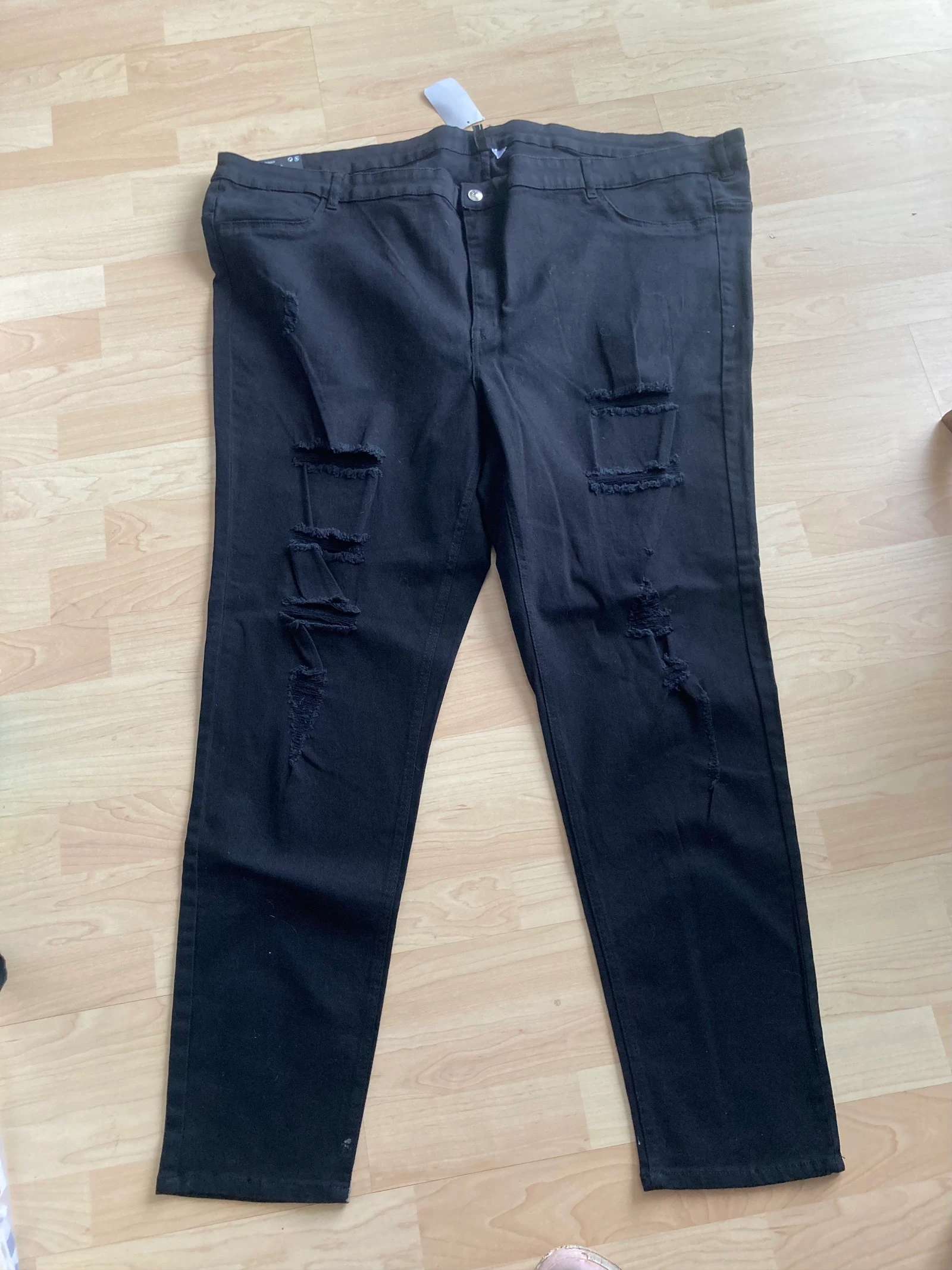 Jean troué taille 60/62